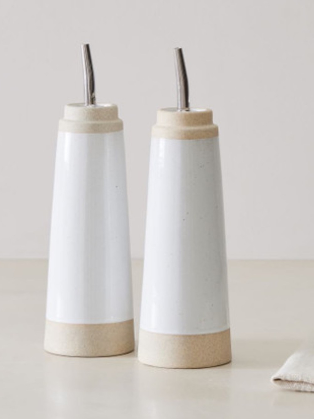 West Elm Ceramic Oil & Vinegar Pourers in White and Tan